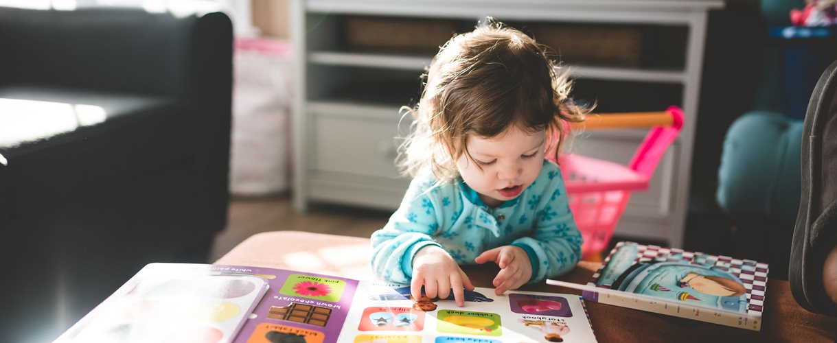 Child reading a book